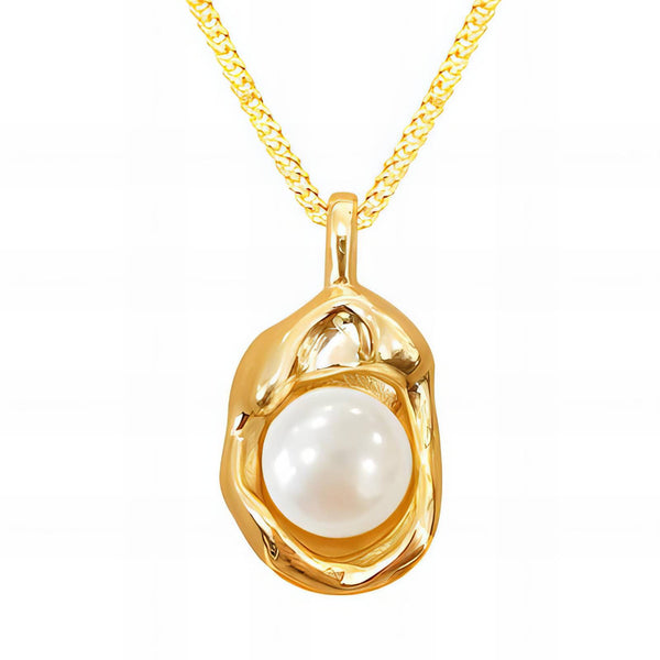 Gold pendant with a pearl on a white background