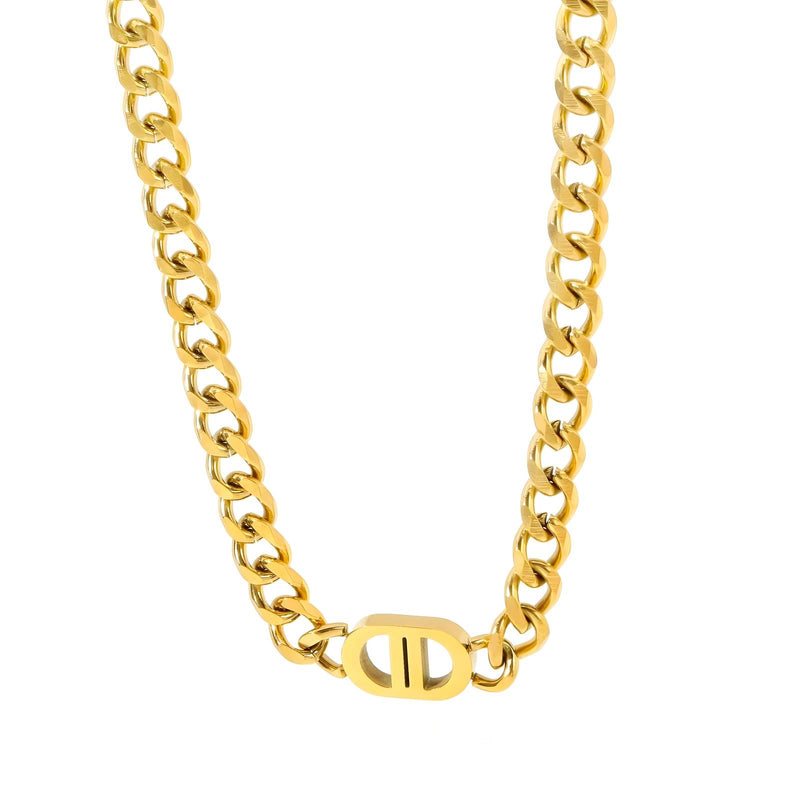 Gold chain necklace on a white background