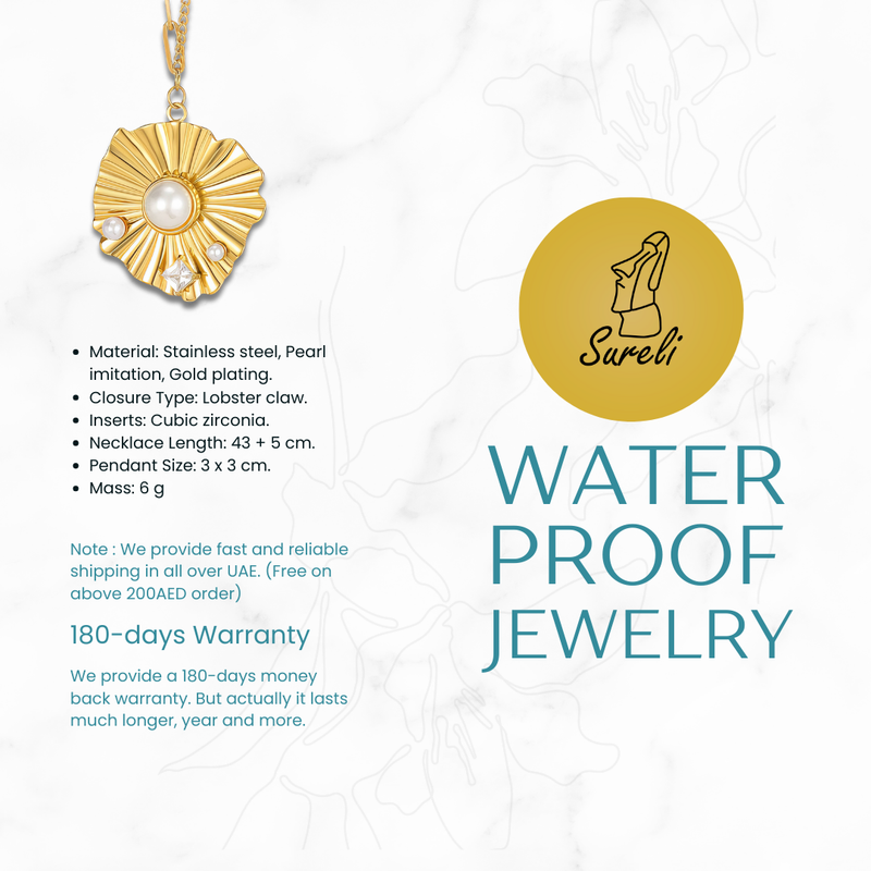 Gold necklace with pendant on a white background, featuring Sureli branding.